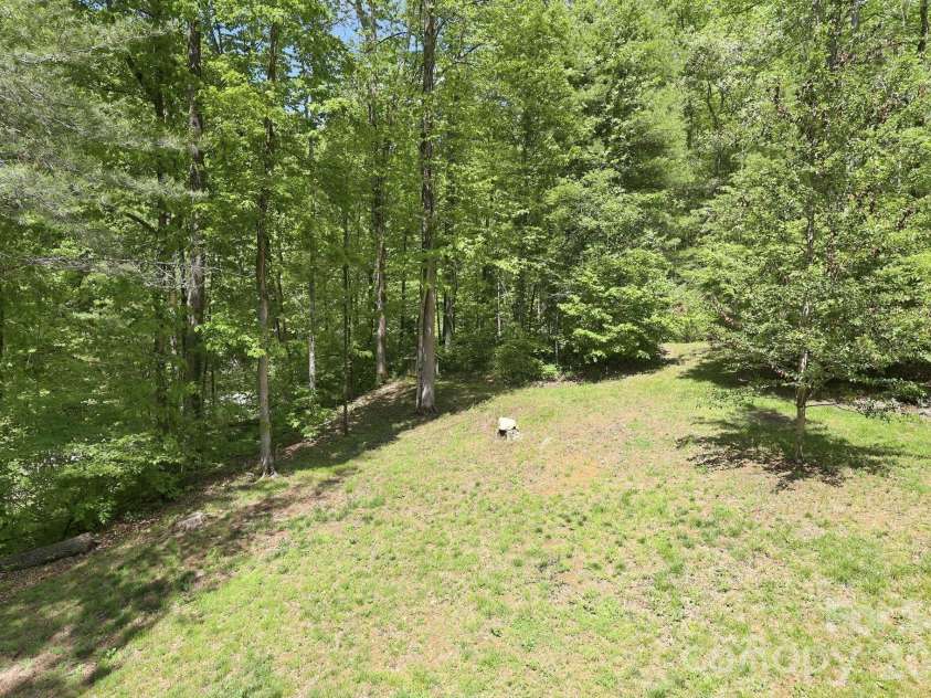 302 Rich Mountain Road, Flat Rock, NC 28731.  MLS# CAR4379587, YatesRealty ID 25740. 