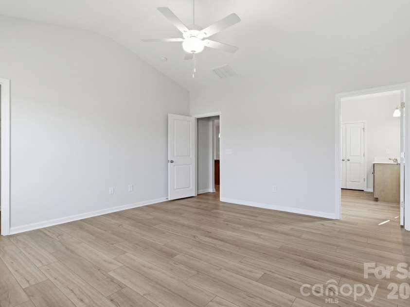 219 Rodeo Drive, Shelby, NC 28150.  MLS# CAR4368777, YatesRealty ID 25743. Primary Bedroom into bathroom