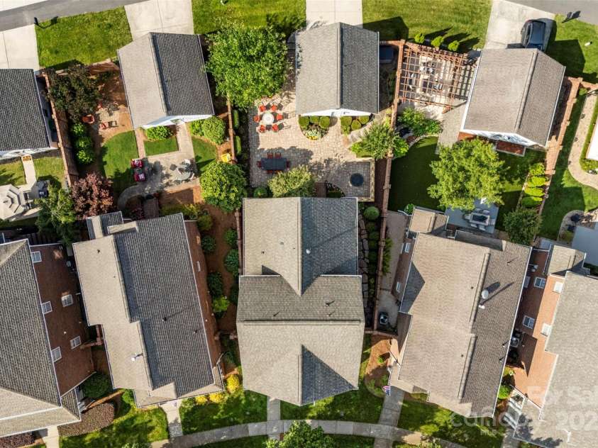 108 Forrester Avenue, Belmont, NC 28012.  MLS# CAR4265770, YatesRealty ID 25744. Aerial view of this stunning home, showcasing the terrace and detached garage.