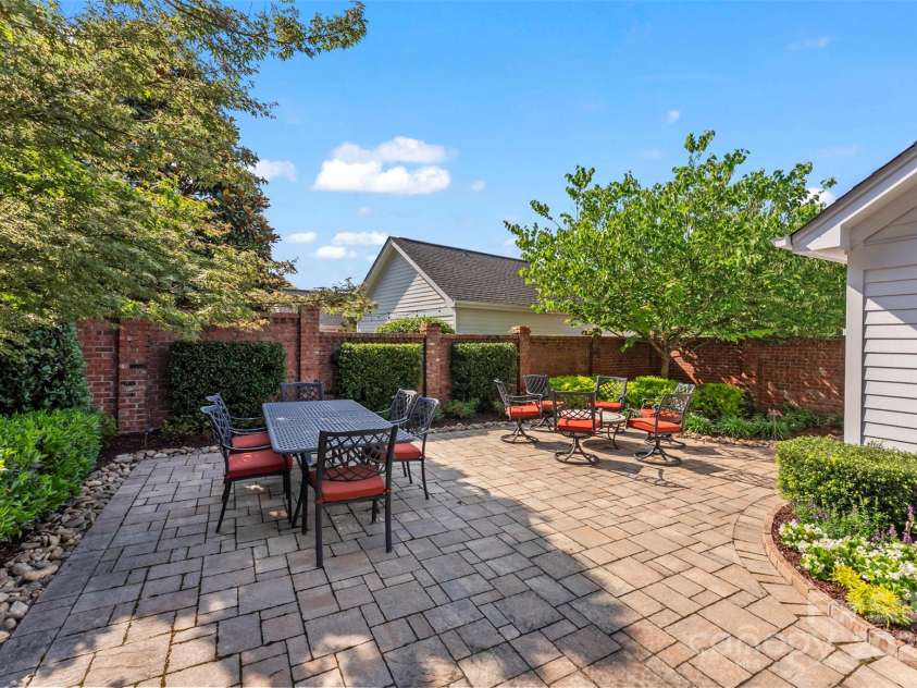 108 Forrester Avenue, Belmont, NC 28012.  MLS# CAR4265770, YatesRealty ID 25744. Multiple seating areas on the outdoor terrace make a perfect place to entertain!