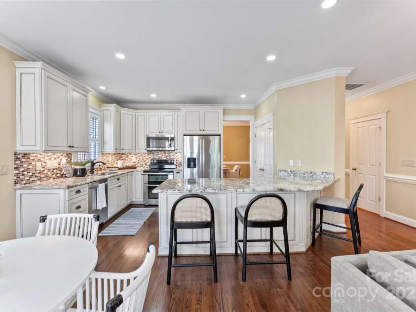 108 Forrester Avenue, Belmont, NC 28012.  MLS# CAR4265770, YatesRealty ID 25744. Recess lighting and lots of windows make this entire area inviting!  Entertain with style in this home!