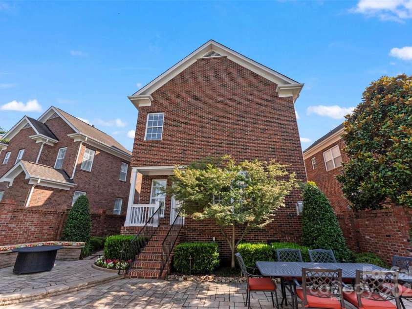 108 Forrester Avenue, Belmont, NC 28012.  MLS# CAR4265770, YatesRealty ID 25744. Simply an amazing terrace, very private and only steps away from the vibrant downtown Belmont.