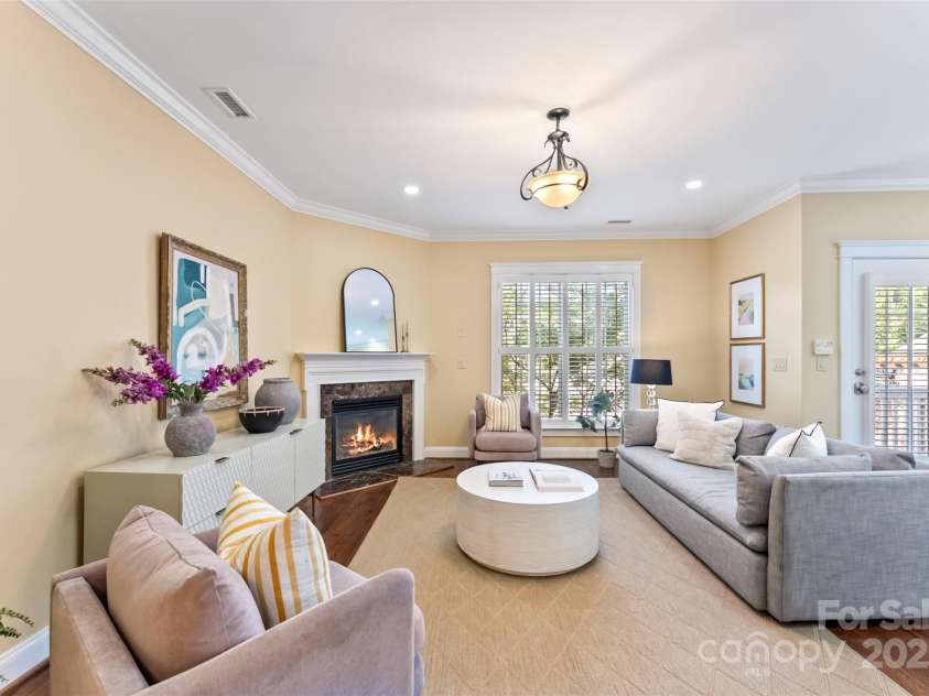 108 Forrester Avenue, Belmont, NC 28012.  MLS# CAR4265770, YatesRealty ID 25744. The oversized Living room has large windows and a gas fireplace!