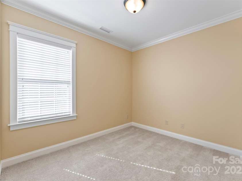 108 Forrester Avenue, Belmont, NC 28012.  MLS# CAR4265770, YatesRealty ID 25744. This is the first bedroom is spacious with a large closet.  Carpet is like new throughout.