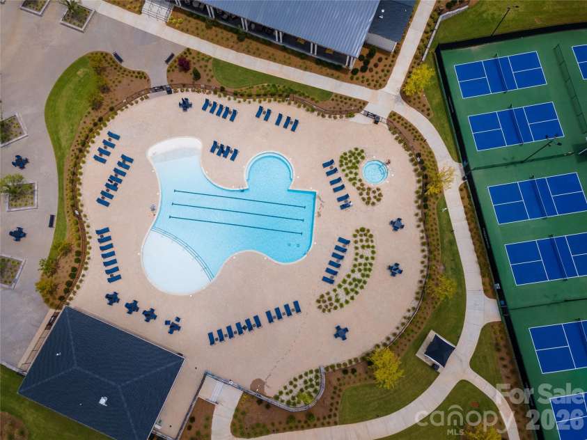 1035 Rabbit Hill Lane, Monroe, NC 28110.  MLS# CAR4382828, YatesRealty ID 25747. Aerial view pool and pickleball courts