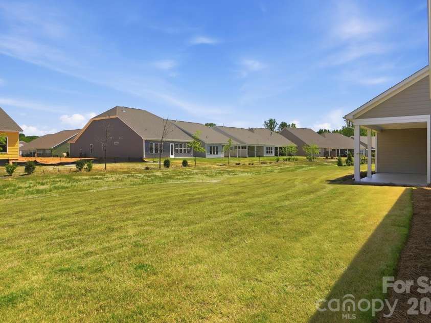 1035 Rabbit Hill Lane, Monroe, NC 28110.  MLS# CAR4382828, YatesRealty ID 25747. Backyard view