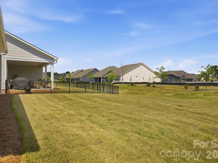 1035 Rabbit Hill Lane, Monroe, NC 28110.  MLS# CAR4382828, YatesRealty ID 25747. Backyard view