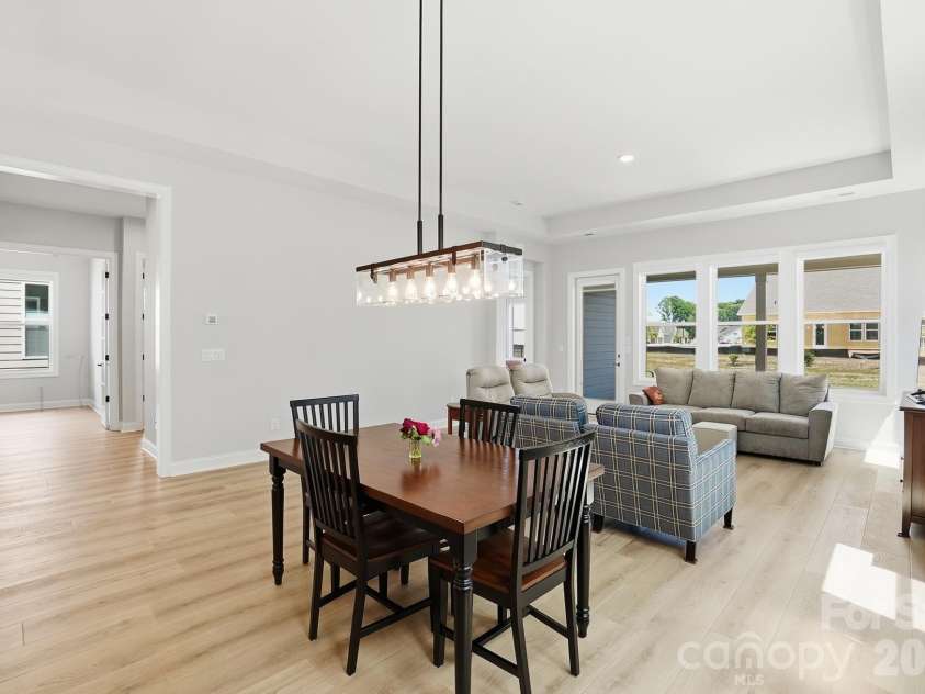 1035 Rabbit Hill Lane, Monroe, NC 28110.  MLS# CAR4382828, YatesRealty ID 25747. Dining area and great room