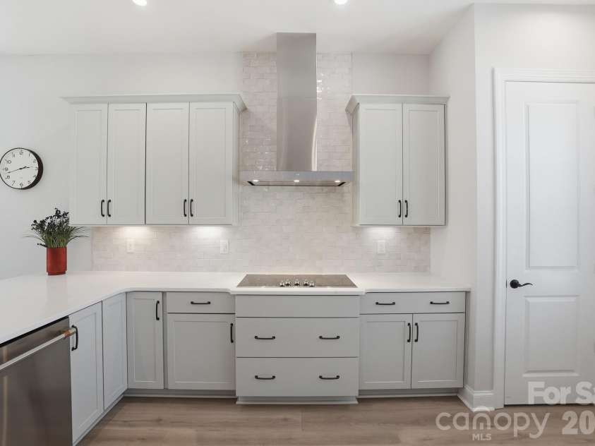 1035 Rabbit Hill Lane, Monroe, NC 28110.  MLS# CAR4382828, YatesRealty ID 25747. Kitchen cabinets/stove/pantry/dishwasher