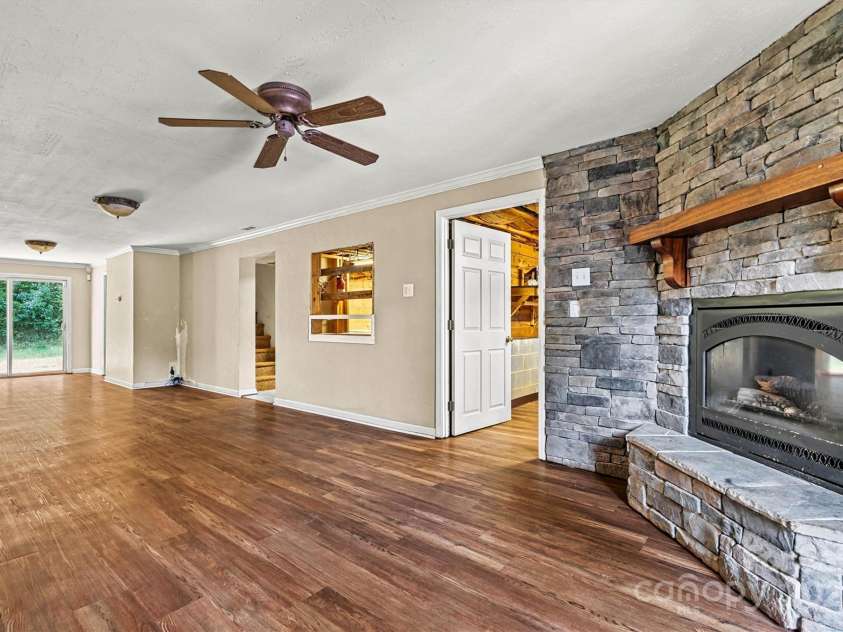 3724 County Home Road, Conover, NC 28613.  MLS# CAR4275725, YatesRealty ID 25751. Basement Living Room/Fireplace View