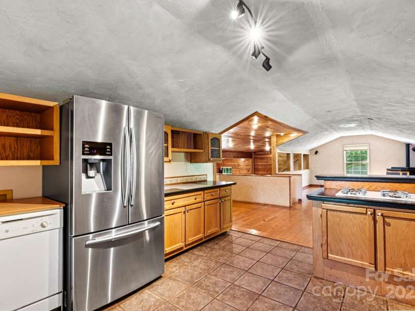 3724 County Home Road, Conover, NC 28613.  MLS# CAR4275725, YatesRealty ID 25751. Kitchen/Living Room View