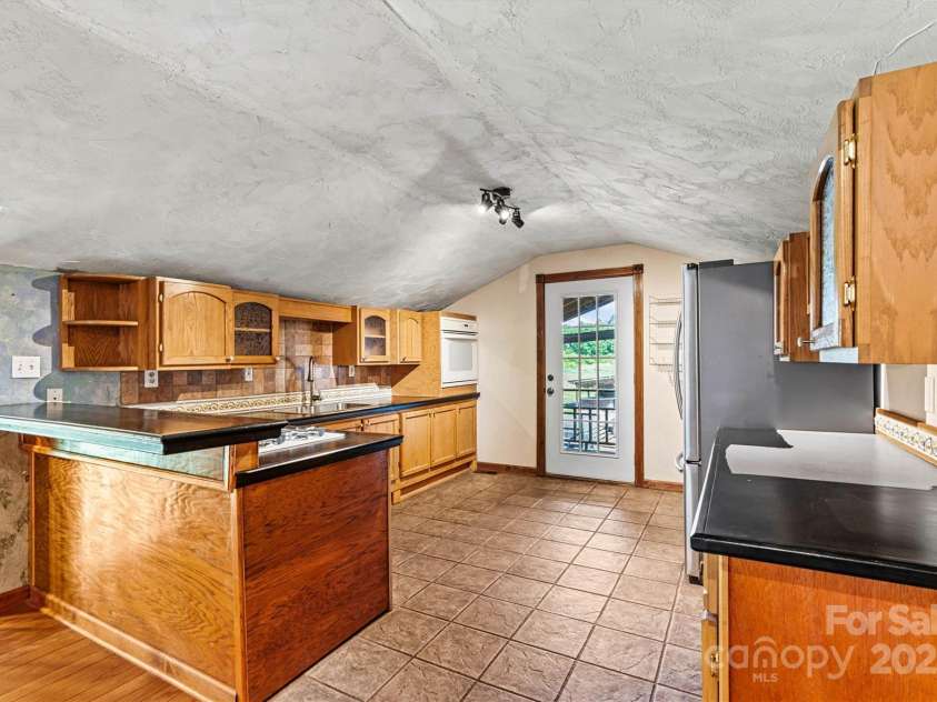 3724 County Home Road, Conover, NC 28613.  MLS# CAR4275725, YatesRealty ID 25751. Kitchen/Side Entry View