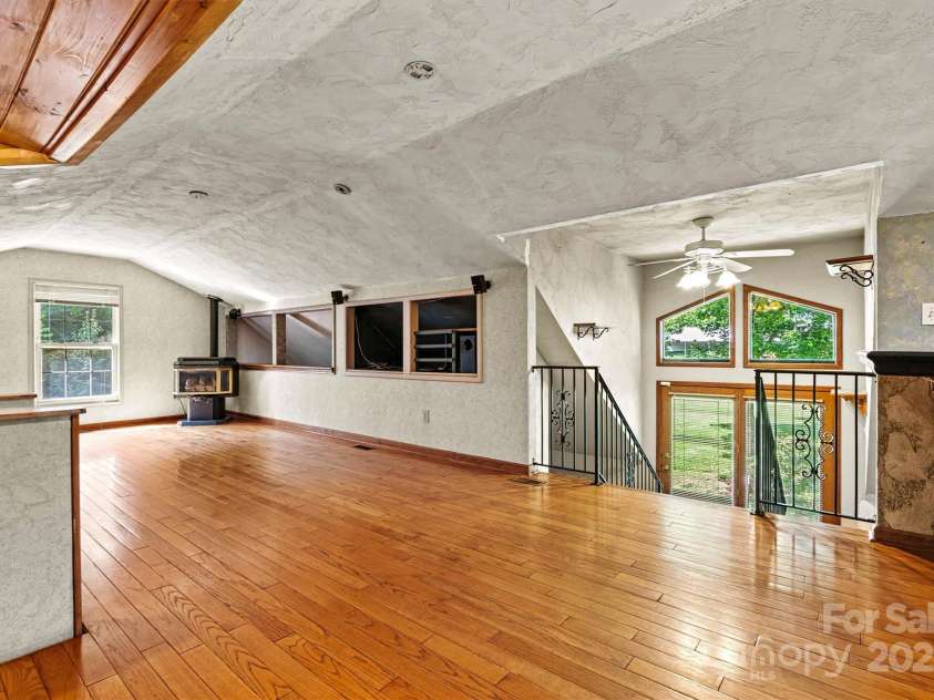 3724 County Home Road, Conover, NC 28613.  MLS# CAR4275725, YatesRealty ID 25751. Main Living Room with Gas Logs/Foyer Entry View