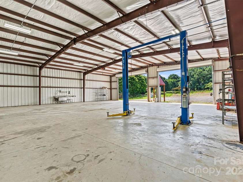 3724 County Home Road, Conover, NC 28613.  MLS# CAR4275725, YatesRealty ID 25751. Metal Shop Entry View