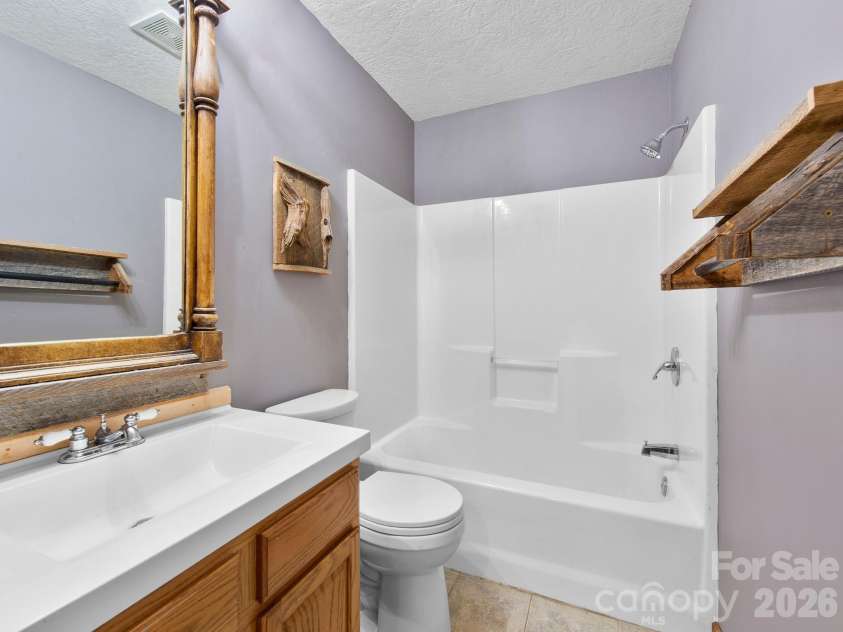 37 Leatherwood Drive, Candler, NC 28715.  MLS# CAR4376131, YatesRealty ID 25753. 