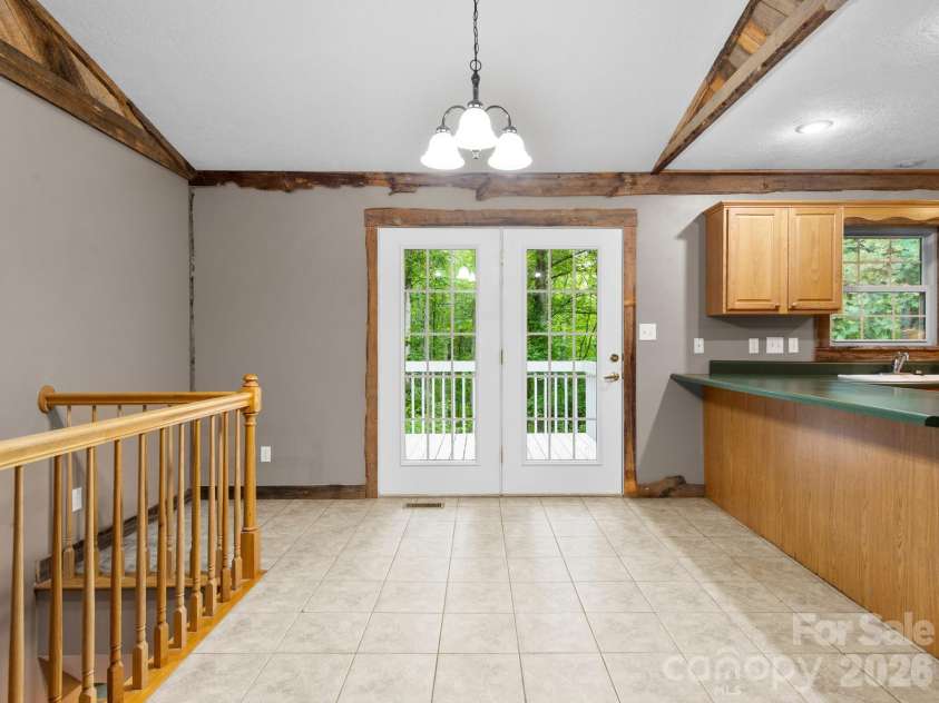 37 Leatherwood Drive, Candler, NC 28715.  MLS# CAR4376131, YatesRealty ID 25753. Open and inviting dinning area