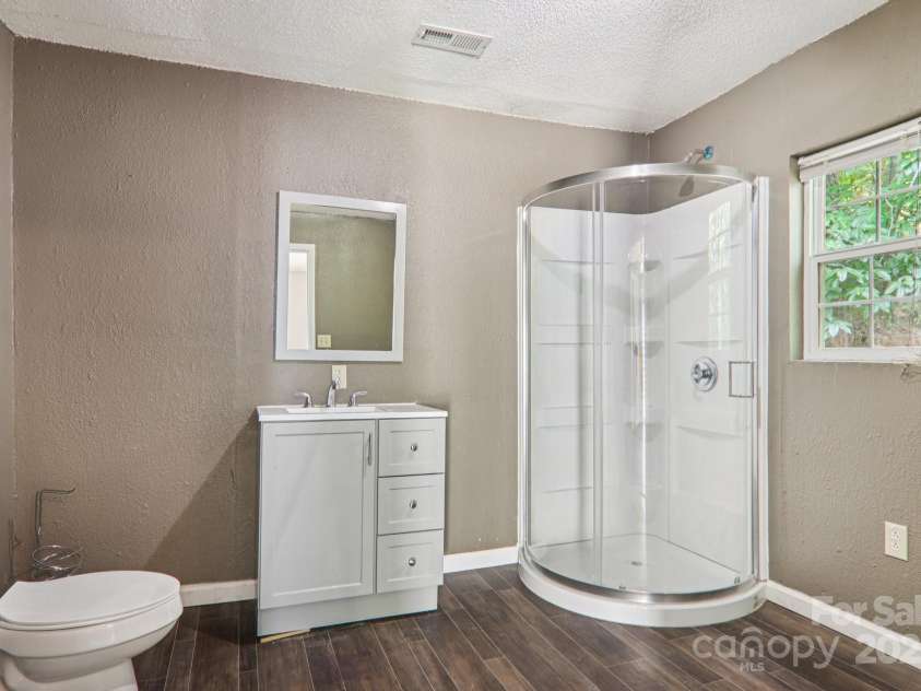 1416 Roy Dula Place, Lenoir, NC 28645.  MLS# CAR4279035, YatesRealty ID 25757. Bathroom in primary bedroom