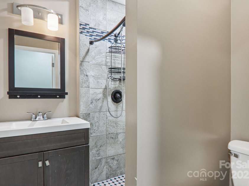 1416 Roy Dula Place, Lenoir, NC 28645.  MLS# CAR4279035, YatesRealty ID 25757. Hallway bathroom