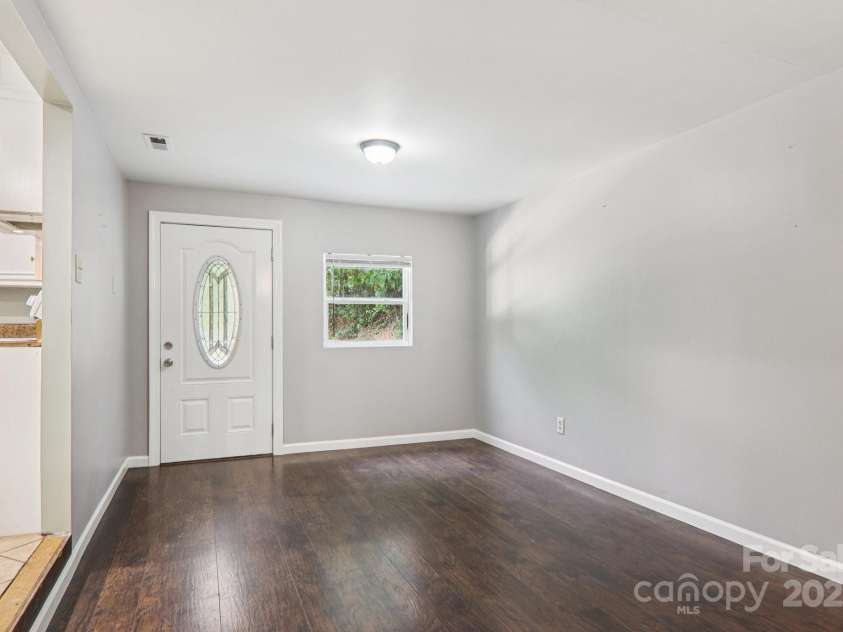 1416 Roy Dula Place, Lenoir, NC 28645.  MLS# CAR4279035, YatesRealty ID 25757. Living room entrance