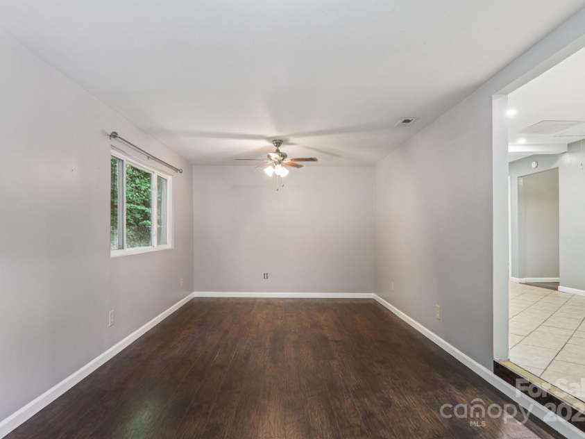 1416 Roy Dula Place, Lenoir, NC 28645.  MLS# CAR4279035, YatesRealty ID 25757. Living room facing inside