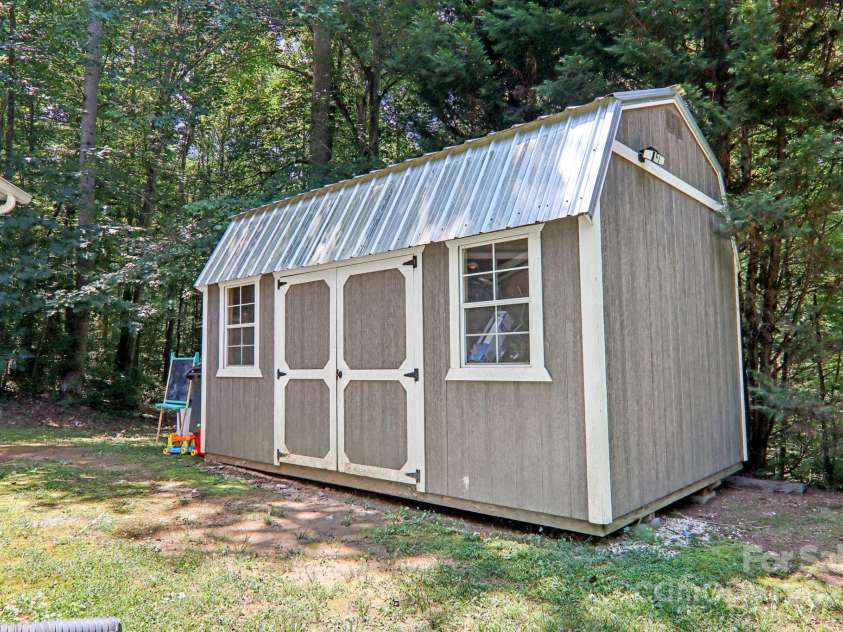 1416 Roy Dula Place, Lenoir, NC 28645.  MLS# CAR4279035, YatesRealty ID 25757. Shed for additional storage space! Personal items to be removed.