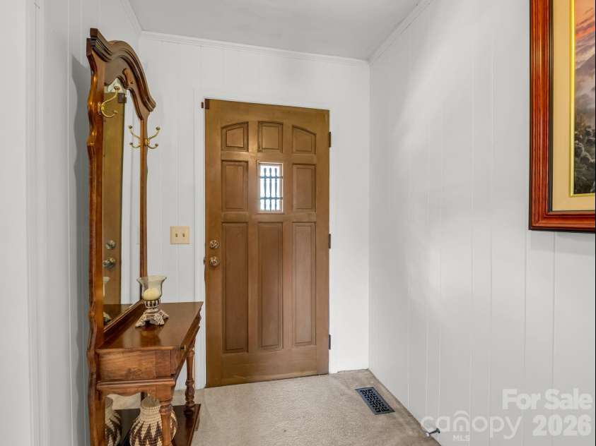 72 McEntire Road, Tryon, NC 28782.  MLS# CAR4411835, YatesRealty ID 25759. Front entryway