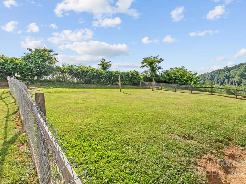 56 Love Fox Road, Burnsville, NC 28714.  MLS# CAR4277030, YatesRealty ID 25760. Fenced back yard!