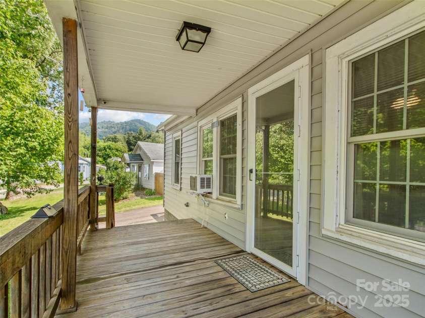56 Love Fox Road, Burnsville, NC 28714.  MLS# CAR4277030, YatesRealty ID 25760. Rocking Chair Front Porch