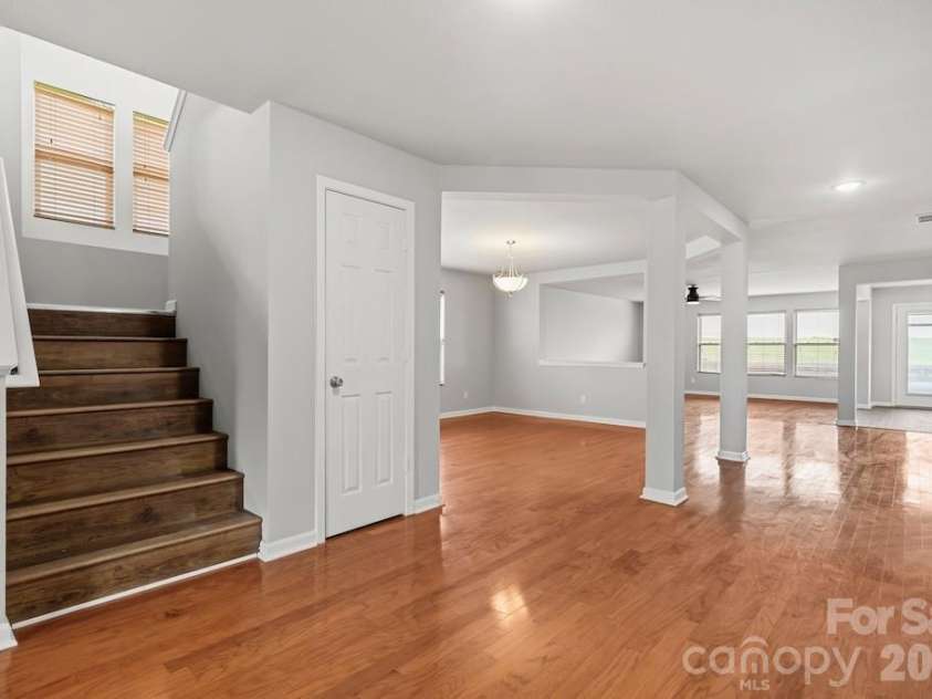 3272 Table Rock Drive, Gastonia, NC 28052.  MLS# CAR4385493, YatesRealty ID 25761. Front stairs and dining room