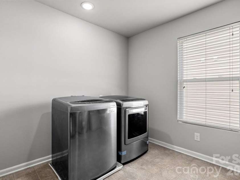 3272 Table Rock Drive, Gastonia, NC 28052.  MLS# CAR4385493, YatesRealty ID 25761. Upper level laundry room