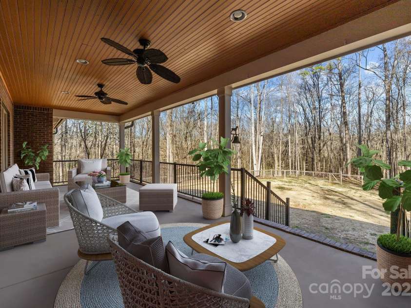 11280 Mcfalls Drive, Indian Land, SC 29707.  MLS# CAR4225880, YatesRealty ID 25762. Another standout feature of the estate is the Lovely open and covered back porch perfect for relaxed dinning or entertaining with family or guests.