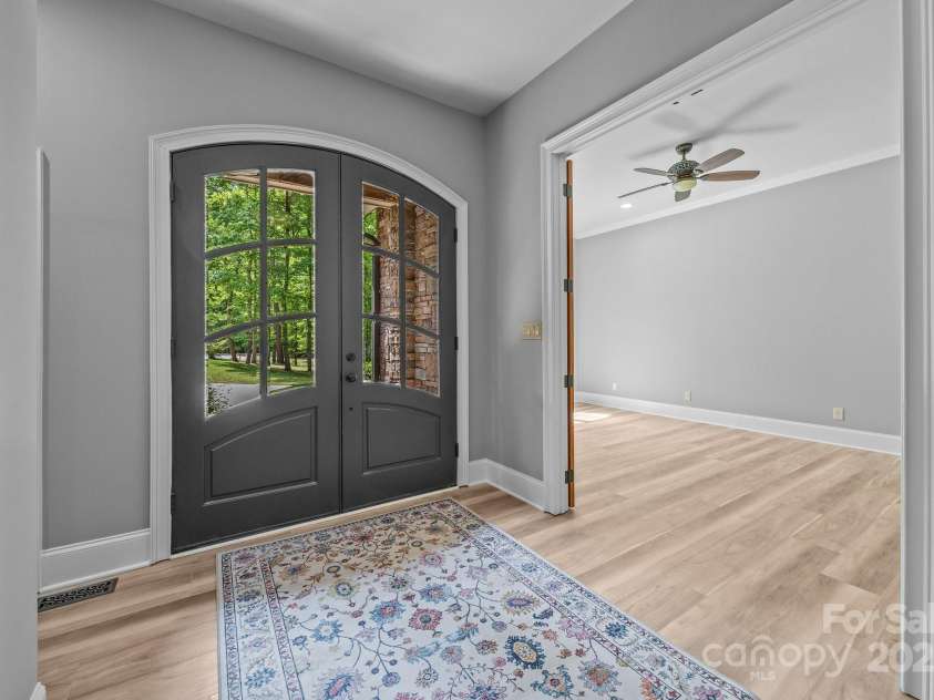 11280 Mcfalls Drive, Indian Land, SC 29707.  MLS# CAR4225880, YatesRealty ID 25762. Entry foyer ad look into office with french doors.