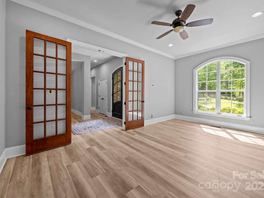 11280 Mcfalls Drive, Indian Land, SC 29707.  MLS# CAR4225880, YatesRealty ID 25762. Expansive home office / study can accommodate your art collection, large furniture or e used as a flex room.