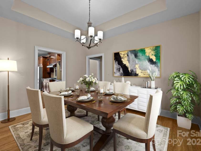 11280 Mcfalls Drive, Indian Land, SC 29707.  MLS# CAR4225880, YatesRealty ID 25762. Seemless flow between the kitchen and dinning room is perfect for hosting events, traditions and family meals.