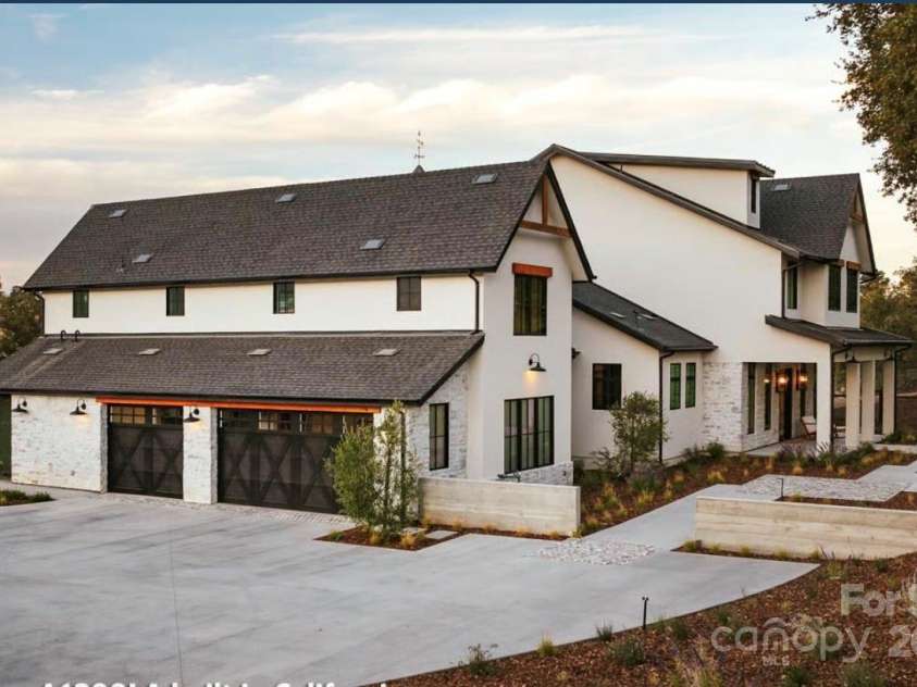 Lot 1 Country Estates Drive, Waxhaw, NC 28173.  MLS# CAR4276299, YatesRealty ID 25764. Sideview of Proposed Modern Farmhouse