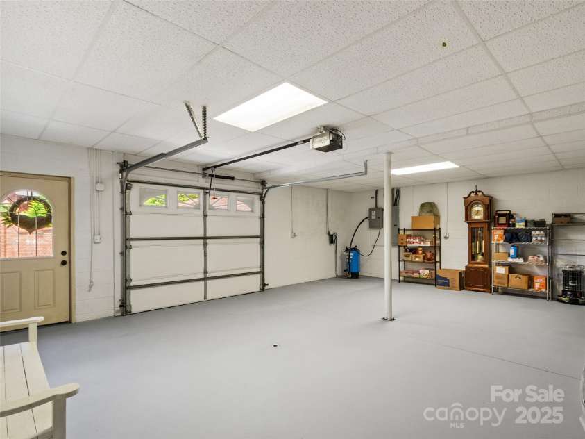 38 Peterson Lane, Green Mountain, NC 28740.  MLS# CAR4279349, YatesRealty ID 25769. Basement garage