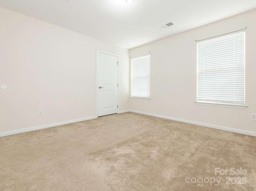 709 Volta Drive, Concord, NC 28027.  MLS# CAR4267575, YatesRealty ID 25770. Third bedroom