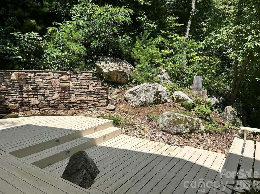 22 Robinhood Road, Asheville, NC 28804.  MLS# CAR4380317, YatesRealty ID 25778. This Deck Grows Rocks !!
