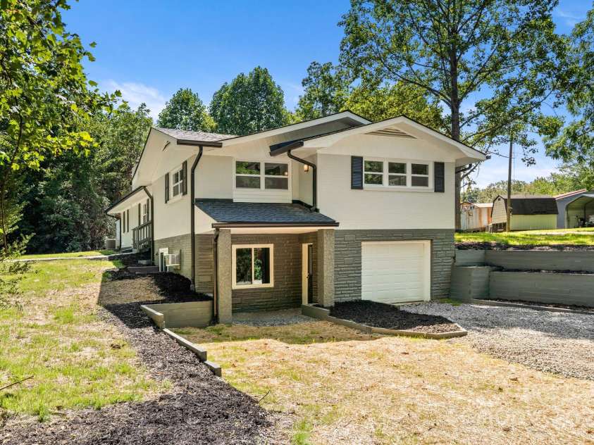 6672 Brevard Road, Etowah, NC 28729.  MLS# CAR4281090, YatesRealty ID 25779. 