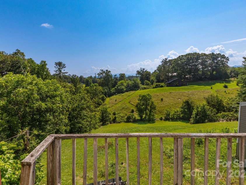 93 Eller Ford Road, Weaverville, NC 28787.  MLS# CAR4279902, YatesRealty ID 25782. 