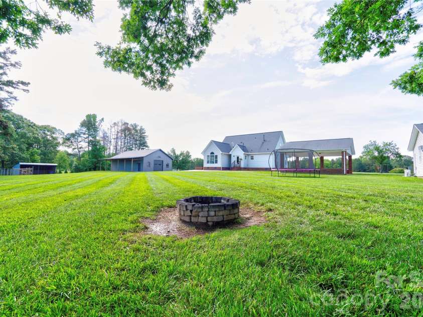 505 Stagecoach Trail, Lawndale, NC 28090.  MLS# CAR4387137, YatesRealty ID 25785. Back Yard