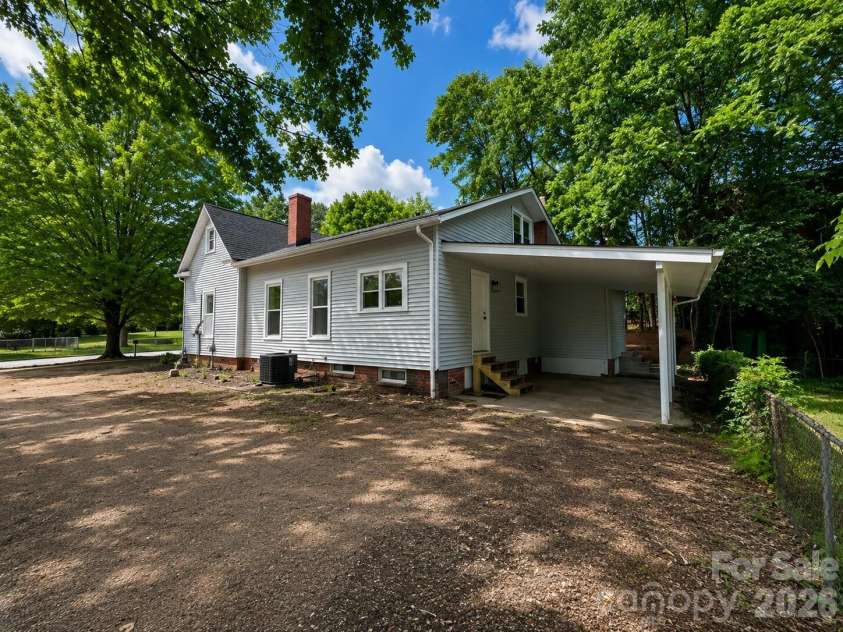 1115 Wilson W Lee Boulevard, Statesville, NC 28677.  MLS# CAR4386897, YatesRealty ID 25791. Carport