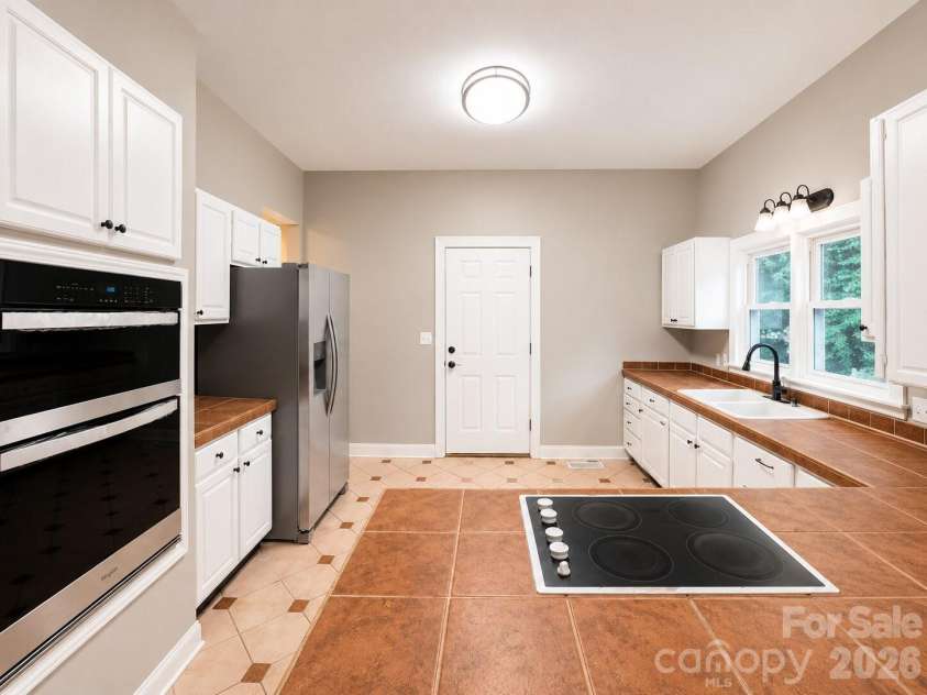 1115 Wilson W Lee Boulevard, Statesville, NC 28677.  MLS# CAR4386897, YatesRealty ID 25791. Kitchen Angled