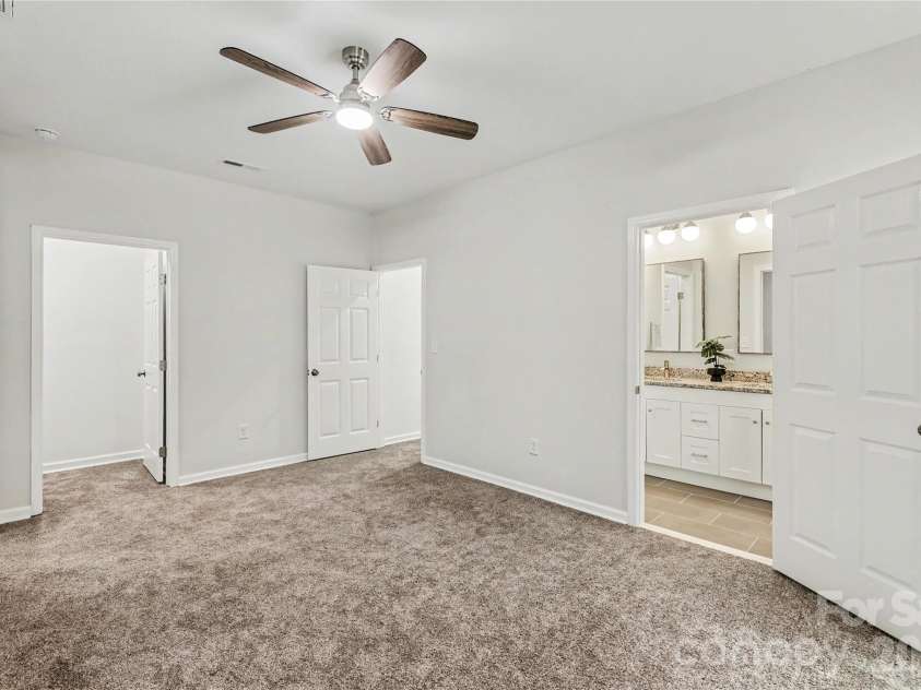122 Johndy Avenue, Kannapolis, NC 28083.  MLS# CAR4387075, YatesRealty ID 25792. Large Primary Suite with en suite and TWO walk-in closets