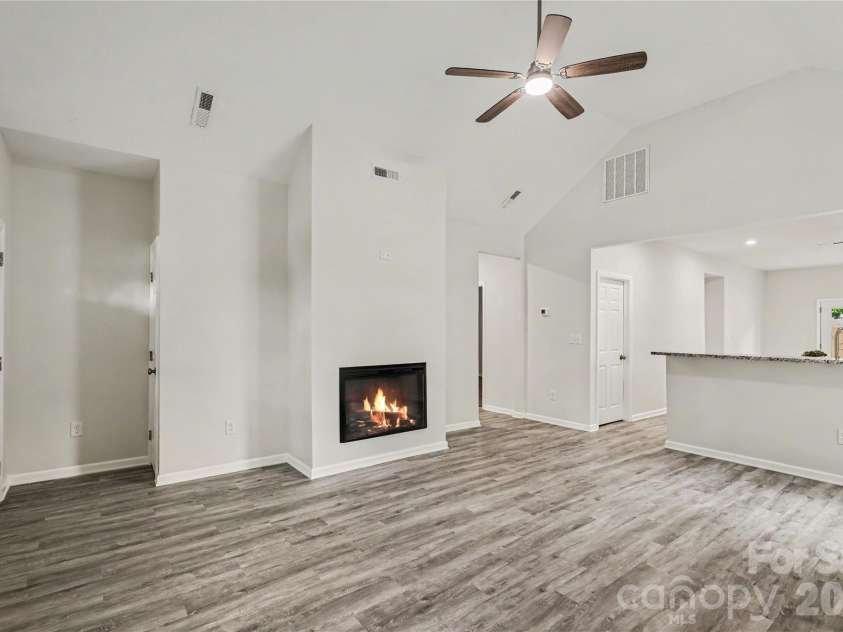 122 Johndy Avenue, Kannapolis, NC 28083.  MLS# CAR4387075, YatesRealty ID 25792. Spacious Living Room with Vaulted Ceiling