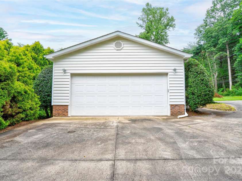 2606 Greenville Highway, Flat Rock, NC 28731.  MLS# CAR4281238, YatesRealty ID 25792. Double Car Garage