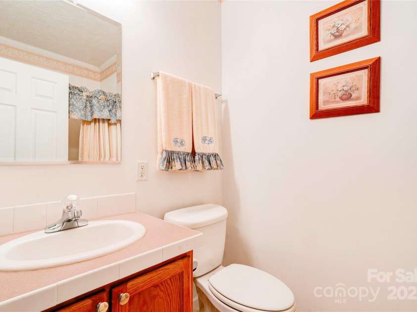 2606 Greenville Highway, Flat Rock, NC 28731.  MLS# CAR4281238, YatesRealty ID 25792. Primary Bath - main level