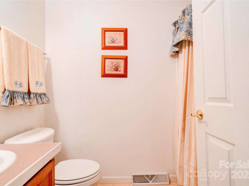 2606 Greenville Highway, Flat Rock, NC 28731.  MLS# CAR4281238, YatesRealty ID 25792. Primary Bath - main level