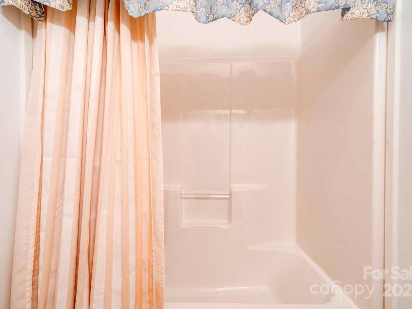 2606 Greenville Highway, Flat Rock, NC 28731.  MLS# CAR4281238, YatesRealty ID 25792. Primary Bath - main level
