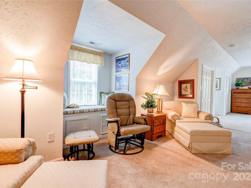 2606 Greenville Highway, Flat Rock, NC 28731.  MLS# CAR4281238, YatesRealty ID 25792. Sitting Room - upper level